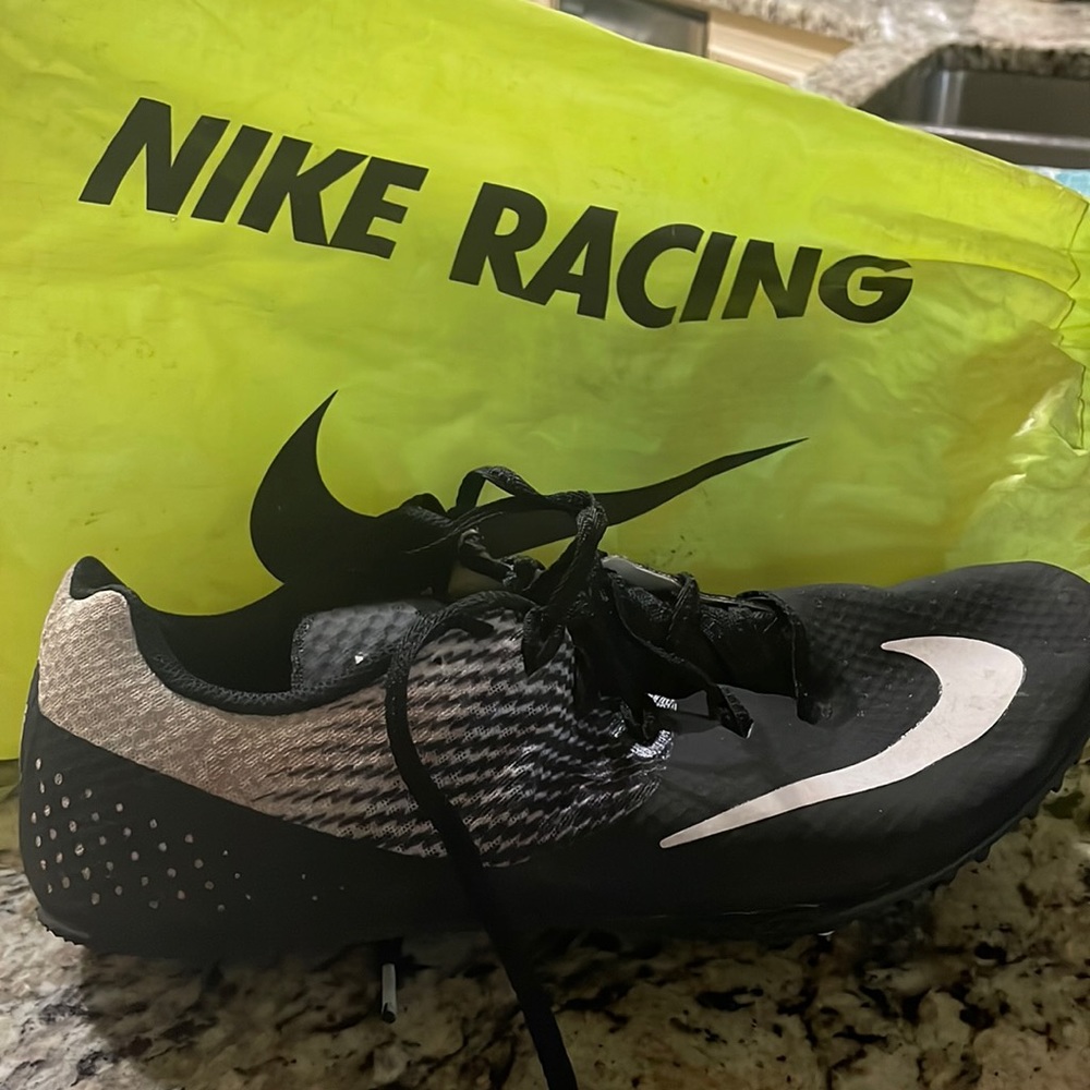 Nike track shoes with spikes usual but good condition